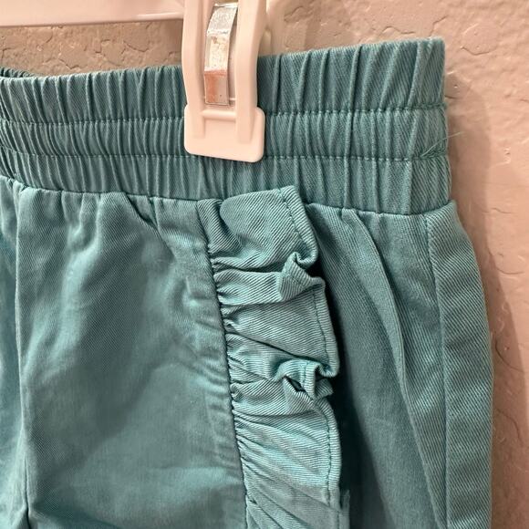 Tea Collection Teal Rumba Ruffle Shorts - Picture 2 of 8